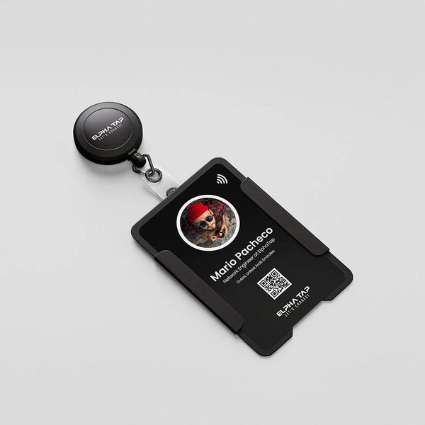 Black AlphaTap ID badge with photo, QR code, and retractable reel for secure access and contactless connection