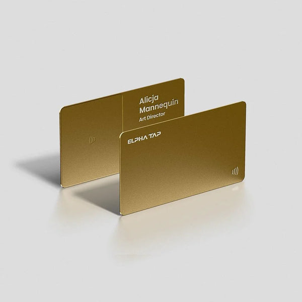 Gold business cards with contactless payment symbol, sleek design for professionals