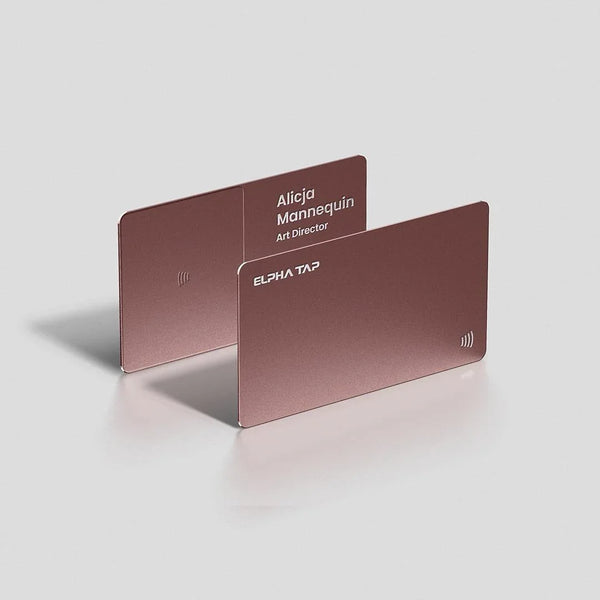Rose gold metal business cards with NFC tap symbol, sleek design for professionals