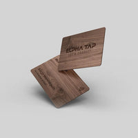 Wooden business card with engraved text and NFC symbol, premium design for professional networking