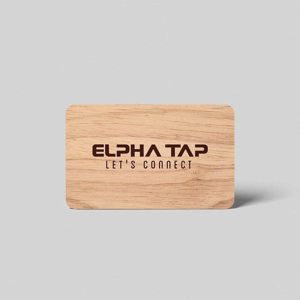 Wooden business card with 'ELPHA TAP LET'S CONNECT' engraved, minimalist design