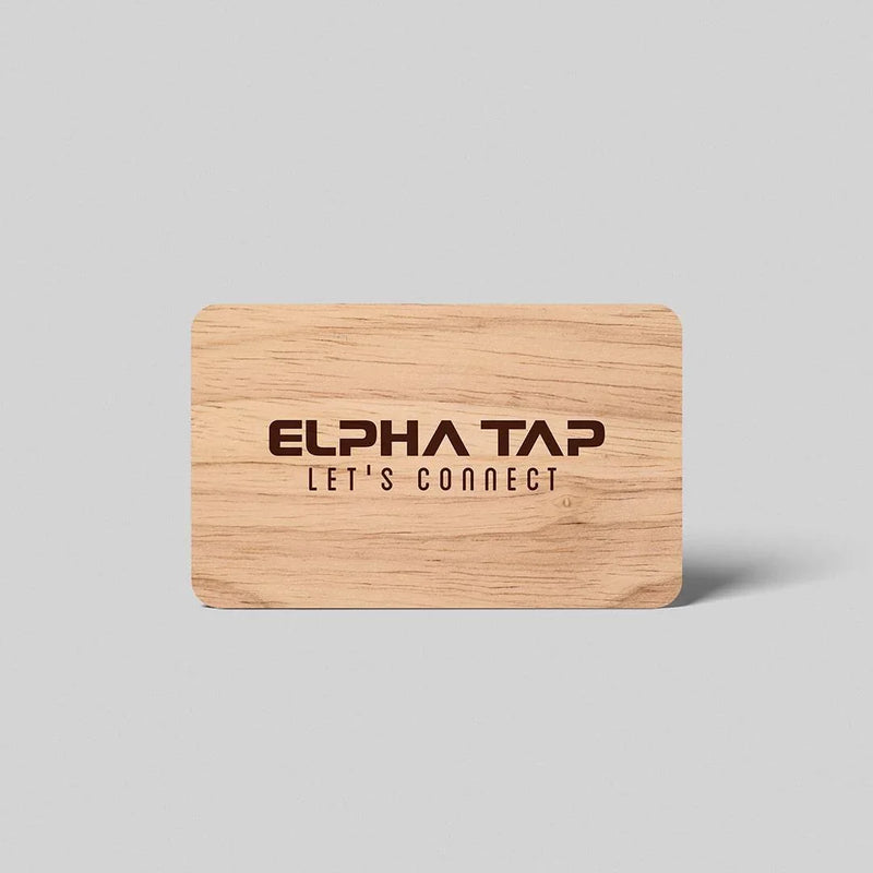 Wooden business card with 'ELPHA TAP LET'S CONNECT' engraved, minimalist design