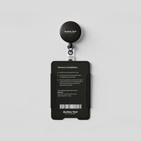 Black ElphaTap ID card holder with retractable badge reel, terms & conditions, barcode, UAE office address