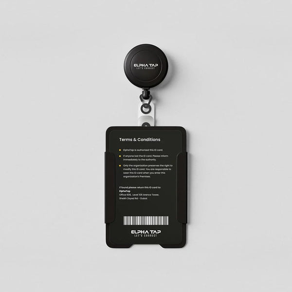 Black ElphaTap ID card holder with retractable badge reel, terms & conditions, barcode, UAE office address