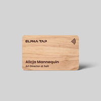 Wooden business card with ELPHA TAP branding and NFC symbol, featuring name and title