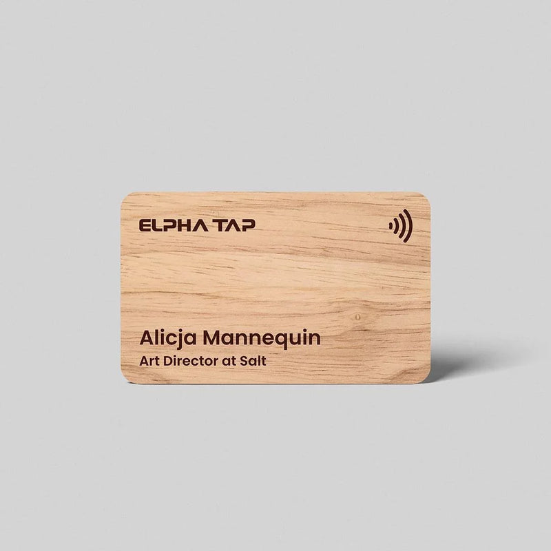 Wooden business card with ELPHA TAP branding and NFC symbol, featuring name and title
