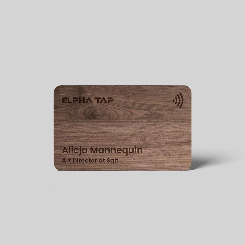 Wooden business card with engraved name and contact details, featuring ELPHA TAP branding and NFC symbol