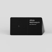 Black minimalist business card with NFC symbol, name Alicja Mannequin, Art Director, sleek design