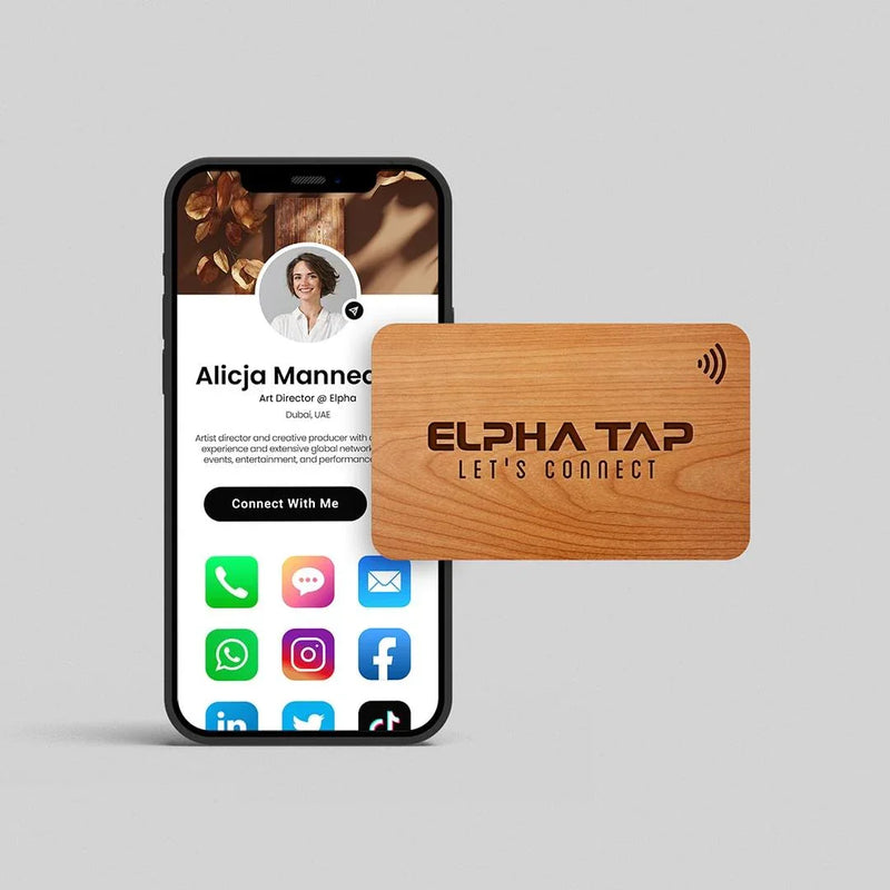 Wooden Alpha Tap NFC business card with smartphone displaying digital profile, UAE contact options