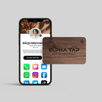Wooden Alpha Tap NFC business card connecting to phone contact profile, UAE